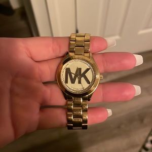 Michael Kors women’s gold watch